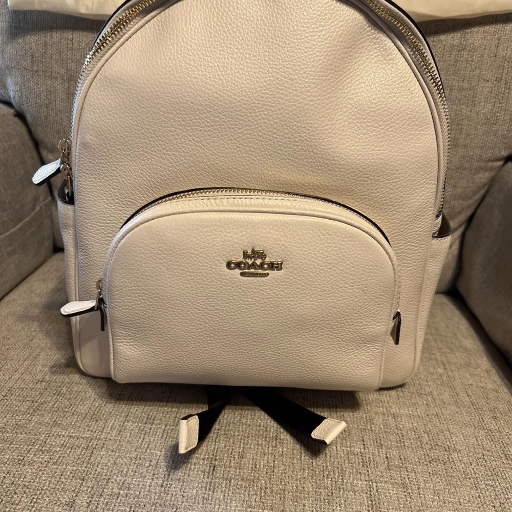 coach chalk white leather backpack.